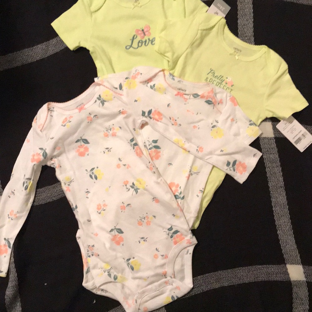 Carter’s 4 piece onesie set
